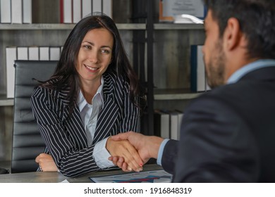 Business Background Of Caucasian Business People Having Handshake For Greeting After Success Business Negociation