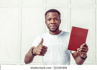 Business Black Man Holding A Book