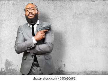 Business Black Man Holding A Gun