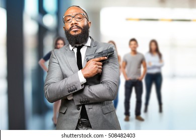 Business Black Man Holding A Gun