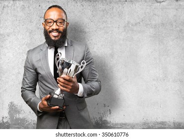 Business Black Man Holding A Trophy