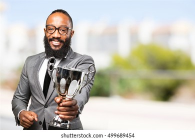 Business Black Man Holding A Trophy