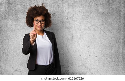 business black woman doing number one gesture