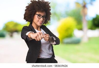 Business Black Woman Doing Punch Gesture