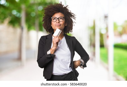 Business Black Woman Holding A Credit Card