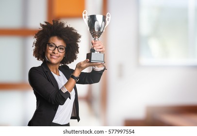 Business Black Woman Holding A Trophy