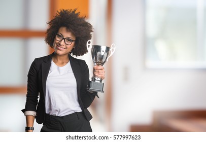 Business Black Woman Holding A Trophy