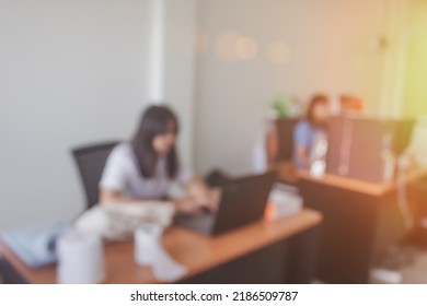 Business Blur In The Workplace At Sitting On A Computer Screen Work Space On Table Desk Work In Office Blurry, Document Division And People Shallow Depth Of Focus Horizontal Abstract Interior.