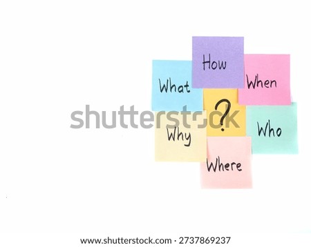 Business brainstorming and problem solving concept with interrogative words on adhesive notes. Perfect concept for brainstorming, journalism, root cause analysis, and strategic planning