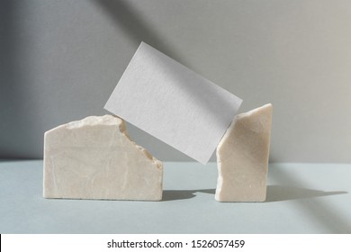 Business card mockup on stone with pastel background - Shutterstock ID 1526057459
