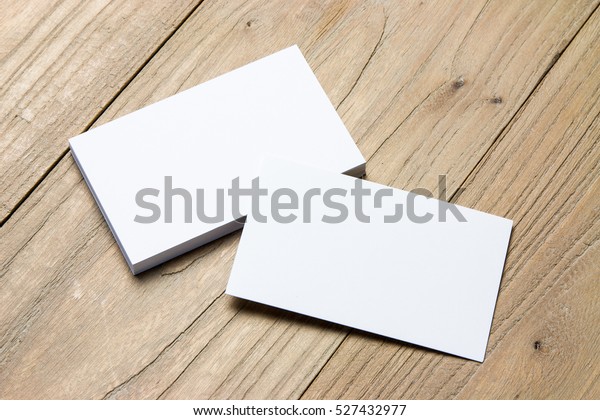 Business card on\
wood