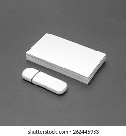 Business Card Template Mockup For Branding Identity Or Contact Information Drawing With Blank Modern Devices. Ready To Print Modern Abstract Design Or Hipster Logo. Isolated On Gray Paper Background.