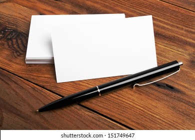 Business Cards And Pen On A Desk