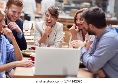 Business Casual Coworkers Having Lunch Break In The Office Restaurant