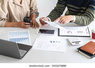 Business casual manager presenting and discussing company growth project success financial statistics, professional investor working start up project for strategy plan with document.