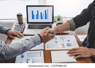 Business Casual Team Shaking Hands After Discussing Good Deal Of Trading To Sign Agreement And Become A Partner, Contract For Both Companies, Successful Business Partnership Handshake.