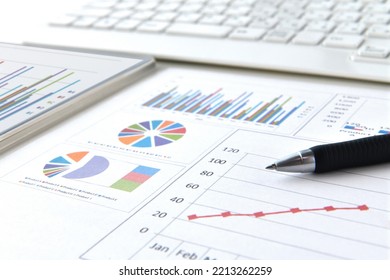 Business chart document and ballpoint pen with no person - Shutterstock ID 2213262259