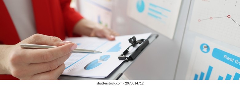 Business Charts For Business Analytics In Female Hands. Small And Medium Business Development Concept