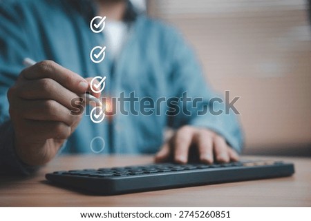 Business checklist and task completion concept with man marking checkmarks on virtual screen, project management, goal achievement, quality control and performance tracking strategy.