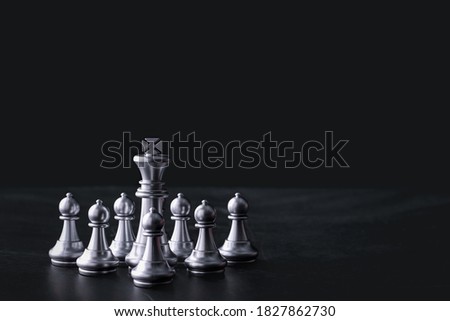 Business chess board game of business strategy and tactic on retro wooden table, idea for management competition, success and leadership concept with copy space for your advertising content.
