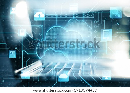 Business cloud computing: digital screen with application cloud service icons and blurry laptop at background