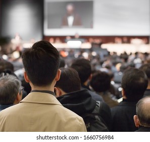 Business Coach. Team Leader Teaches Employees At A Business Meeting In A Conference Room. Speaker Giving A Talk At A Corporate Business Seminar.
Audience In Hall With Presenter In Lecture Photo.
