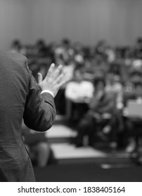 Business Coach. Team Leader Teaches Employees At A Business Meeting In A Conference Room. Speaker Giving A Talk At A Corporate Business Seminar.
Audience In Hall With Presenter In Lecture Photo.
