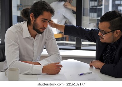 Business Coaching Session With Two Males Pacific Islanders And Maori