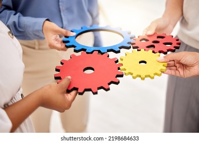 Business, collaboration and gears for strategy success and team unity and support for a project. Hands of a group of corporate employees with a common goal in a partnership for innovation - Shutterstock ID 2198684633