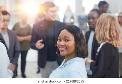 Business Colleagues Making Small Talk In Their Break