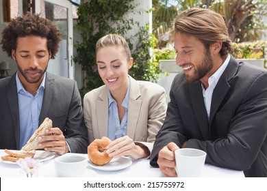 Business Colleagues On Their Lunch Outside At The Coffee Shop