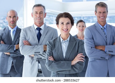 Business Colleagues Standing In A Row In The Office