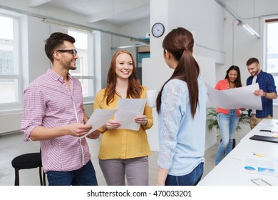 business, communication, startup and people concept - happy multiracial creative team or students on coffee break talking at office - Shutterstock ID 470033201