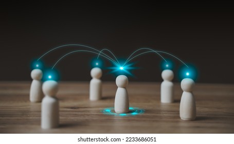 Business and communication technology concept. Chain of people figurines connected. Cooperation and interaction between people and employees. Dissemination of information in HR  society. - Shutterstock ID 2233686051