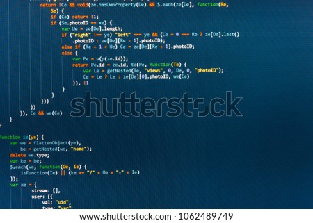 IT business company. Computer script typing work.  IT coding on monitor screen. Abstract computer script code. Screen of web developing javascript code. Source code close-up. 