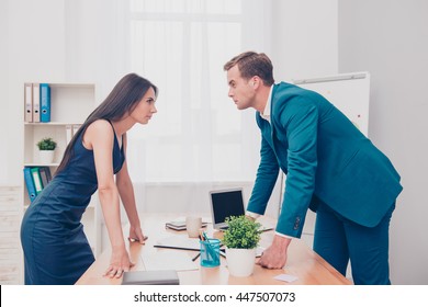 Business competition. Two colleagues having disagreement and conflict