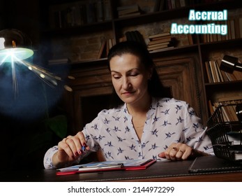 Business concept about Accrual Accounting Business woman, executive manager hand filling paper business document