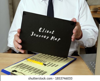 Business Concept About Client Journey Map With Inscription On The Sheet.
