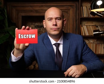 Business Concept About Escrow With Inscription On Blank Business Card.
