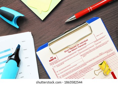 Business Concept About Form 4506T-EZ Short Request For Individual Tax Return Transcript With Sign On The Sheet.