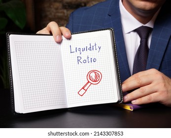 Business Concept About Liquidity Ratio With Phrase On Blank Notepad.
