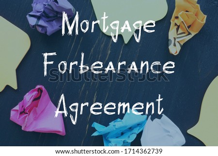 Business concept about Mortgage Forbearance Agreement with inscription on the piece of paper.