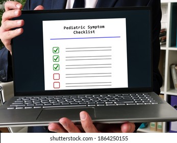 Business Concept About Pediatric Symptom Checklist With Sign On The Page..