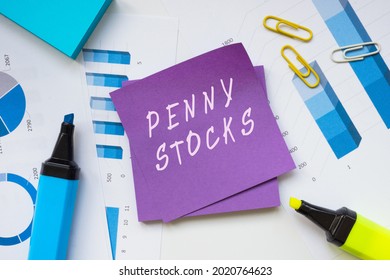 Business concept about PENNY STOCKS with phrase on the piece of paper.  - Shutterstock ID 2020764623