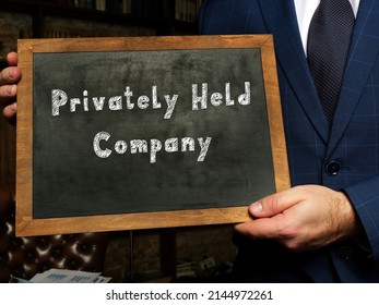 Business concept about Privately Held Company with phrase on the black chalkboard.