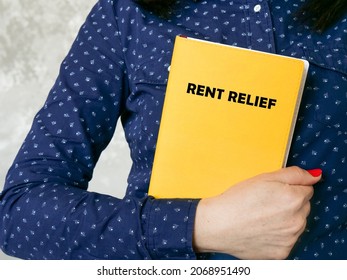 Business Concept About RENT RELIEF With Phrase On The Sheet. 
