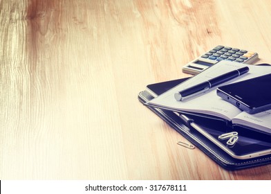 Business concept with agenda, smartphone and calculator. Copy space - Shutterstock ID 317678111