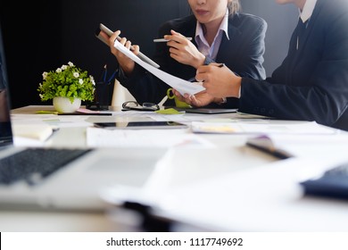 Business Concept, Audit team working with tablet computer and paper report in finance office. - Shutterstock ID 1117749692