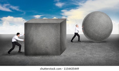 Business concept businessman pushing a sphere leading the race against a slower businessmen pushing box. Winning strategy, efficiency, innovation in business concept - Shutterstock ID 1154435449