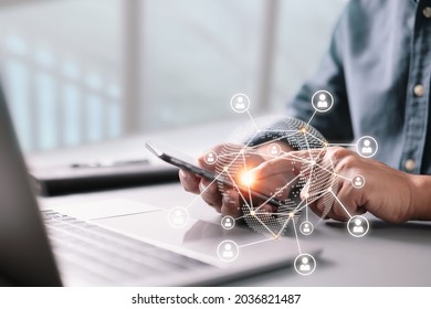 Business Concept. Businessman Working Generic Design Laptop. Worldwide Connection Technology Interface. Touching Screen Smartphone.